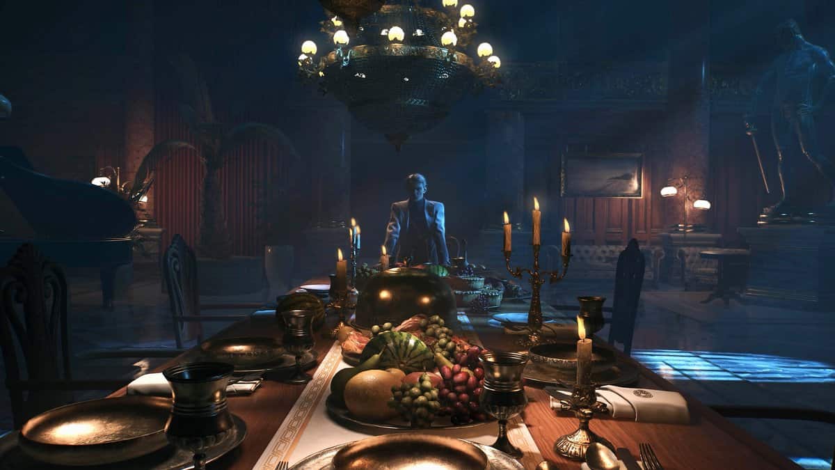 Longue table de banquet éclairée aux chandelles dans une salle luxueuse, un homme en costume assis au bout