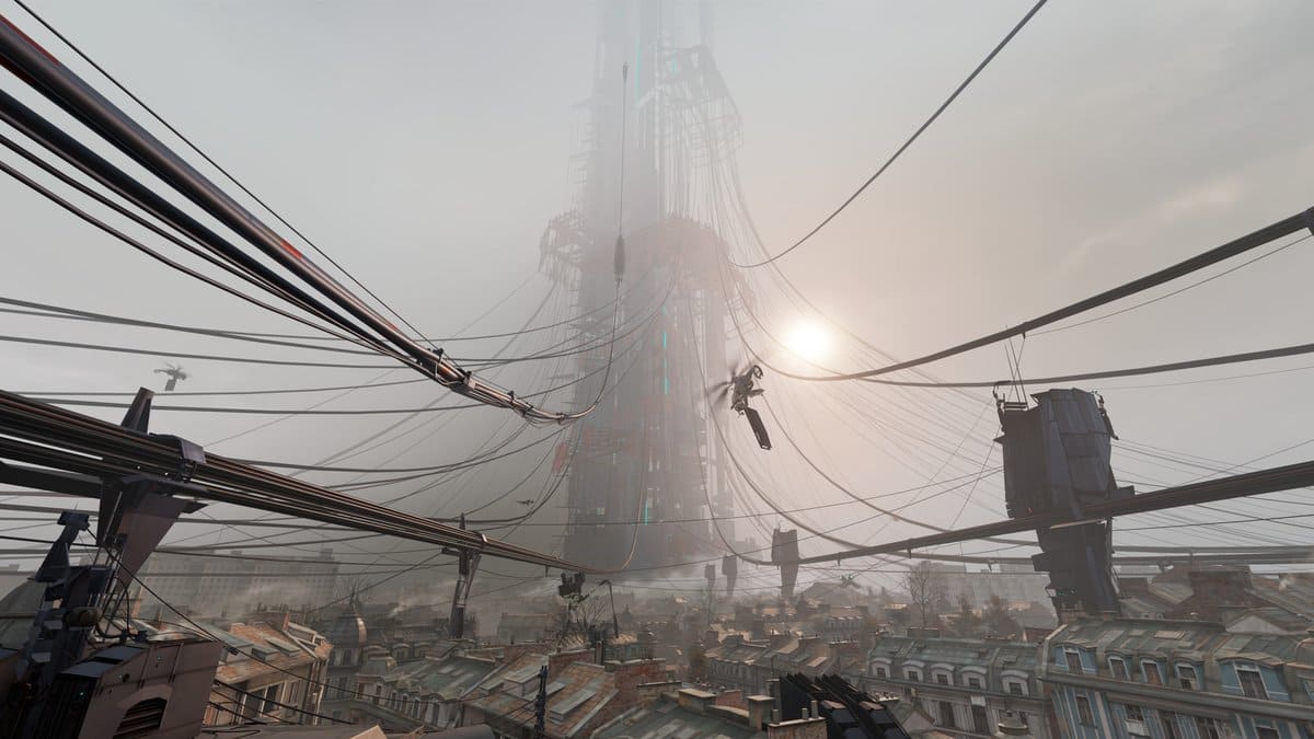 Citadelle du Cartel dominant les toits de City 17 dans la brume, au milieu de câbles tendus