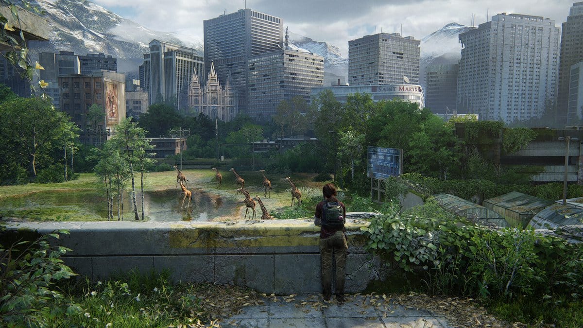 Ellie observe un troupeau de girafes au cœur d'une ville abandonnée envahie par la nature