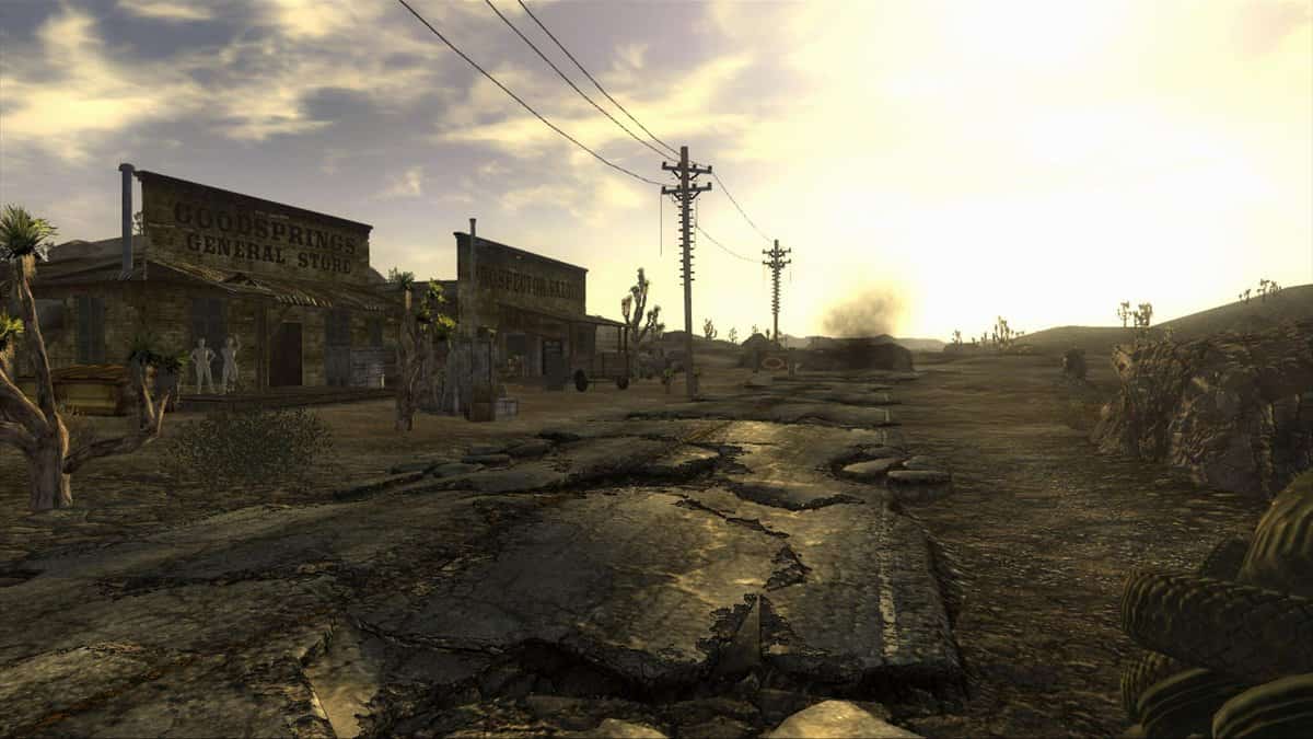 Une route défoncée traverse Goodsprings, devant le magasin général du village, dans le désert du Mojave