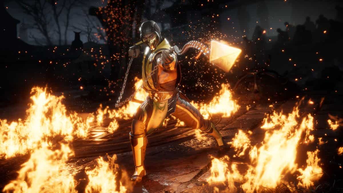 Scorpion lance son kunai enchaîné au milieu des flammes dans Mortal Kombat 11